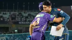 GT captain Shubman Gill (right) hugs KKR skipper Ajinkya Rahane