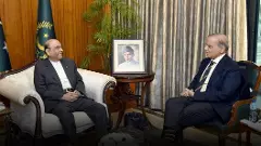 Pakistans President Asif Ali Zardari (left) and Prime Minister Shehbaz Sharif