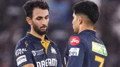 Prasidh Krishna (left) with GT captain Shubman Gill