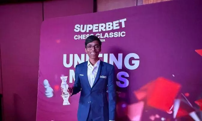 Praggnanandhaa with trophy Praggnanandhaa with trophy