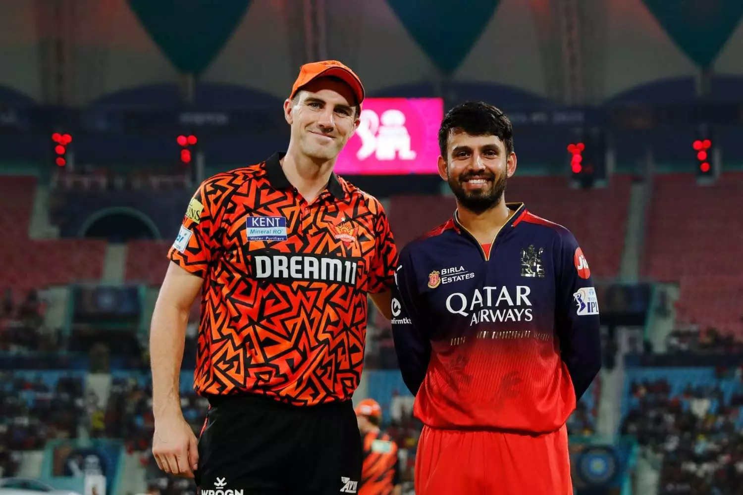SRH captain Pat Cummins (left) and RCB skipper Jitesh Sharma SRH captain Pat Cummins (left) and RCB skipper Jitesh Sharma