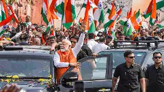 PM Modi arrives in Gujarat for two-day visit; holds roadshow in Vadodara