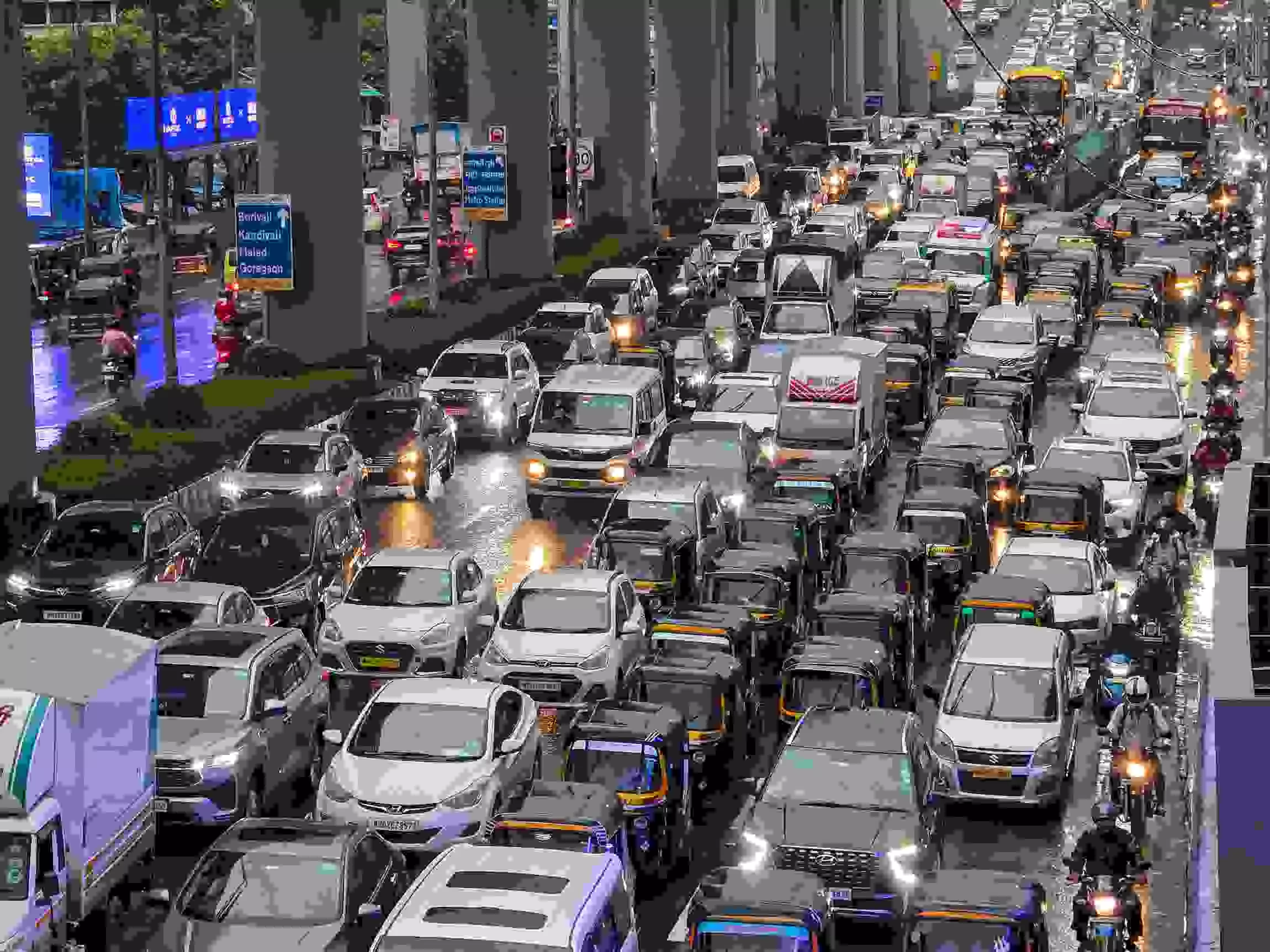 Rains bring traffic to a standstill in Mumbai. PTI File Photo Rains bring traffic to a standstill in Mumbai. PTI File Photo