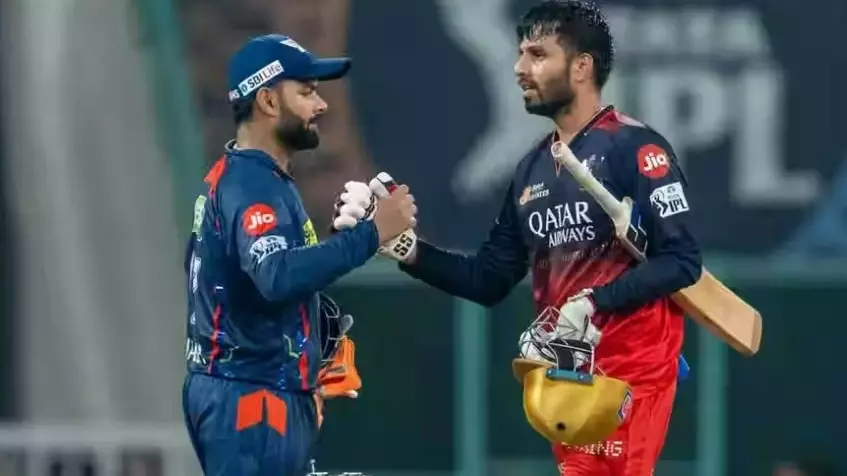 LSG captain Rishabh Pant (left) and RCBs stand-in skipper Jitesh Sharma