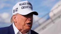 Trump grants wave of pardons to politicians, celebs and rapper NBA Youngboy