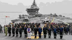 Defence Minister Rajnath Singh with Navy officers onboard INS Vikrant