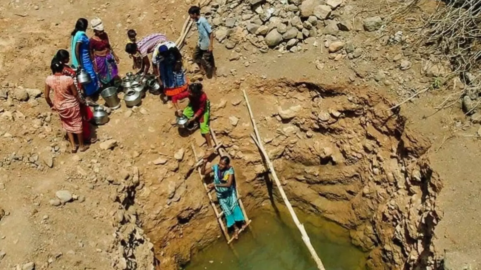 Women risked their lives to draw water from the local well. Women risked their lives to draw water from the local well.