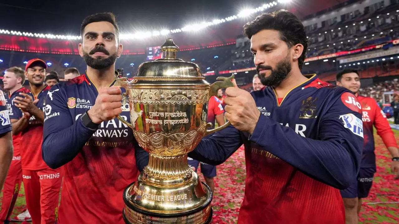 RCB captain Rajat Patidar (right) and teammate Virat Kohli