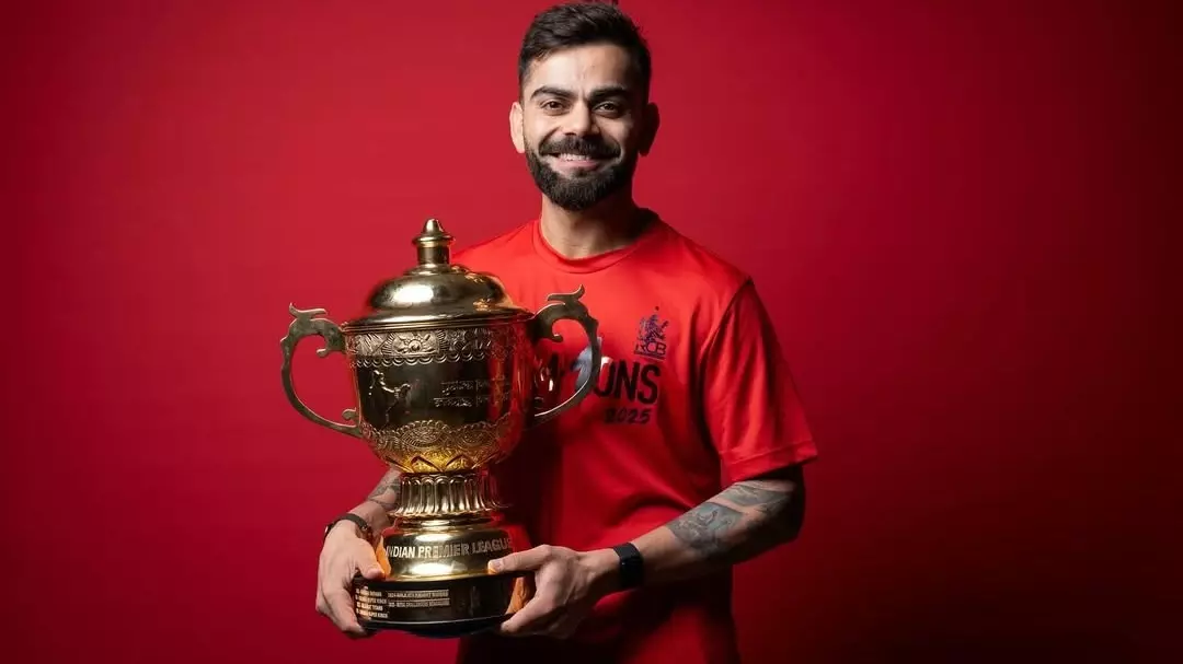Virat Kohli with the IPL trophy