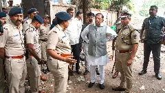 Karnataka Home Minister G Parameshwara with Bengaluru City Commissioner of Police B Dayananda during an inspection