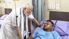Modi with Ahmedabad crash survivor