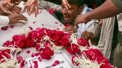 The family of 13-year-old Akash who was a ground victim grieve him after receiving his remains in a coffin