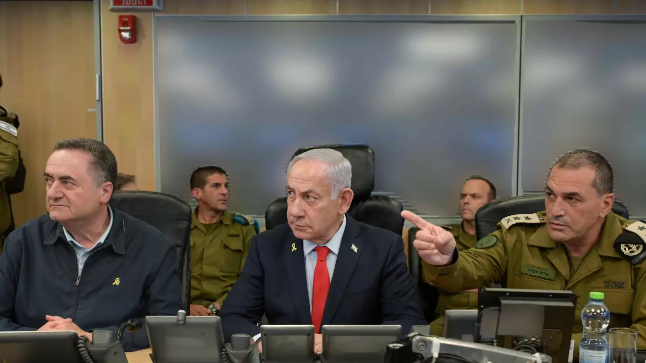 Israel PM Benjamin Netanyahu (Centre) on May 5,2025  at the Air Force base in Kirya