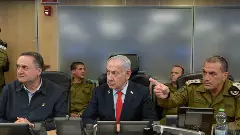Israel PM Benjamin Netanyahu (Centre) on May 5,2025  at the Air Force base in Kirya
