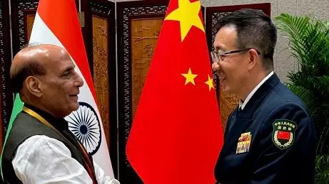 Rajnath Singh meets Dong Jun