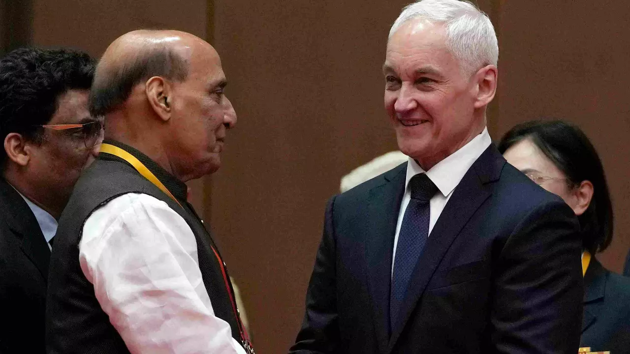Russian Defence Minister Andrei Belousov, right, with Rajnath Singh