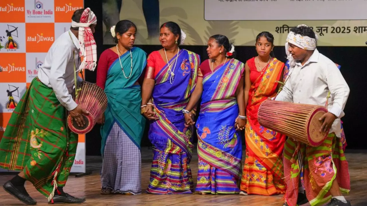 Artistes perform during a Hul Diwas event in New Delhi