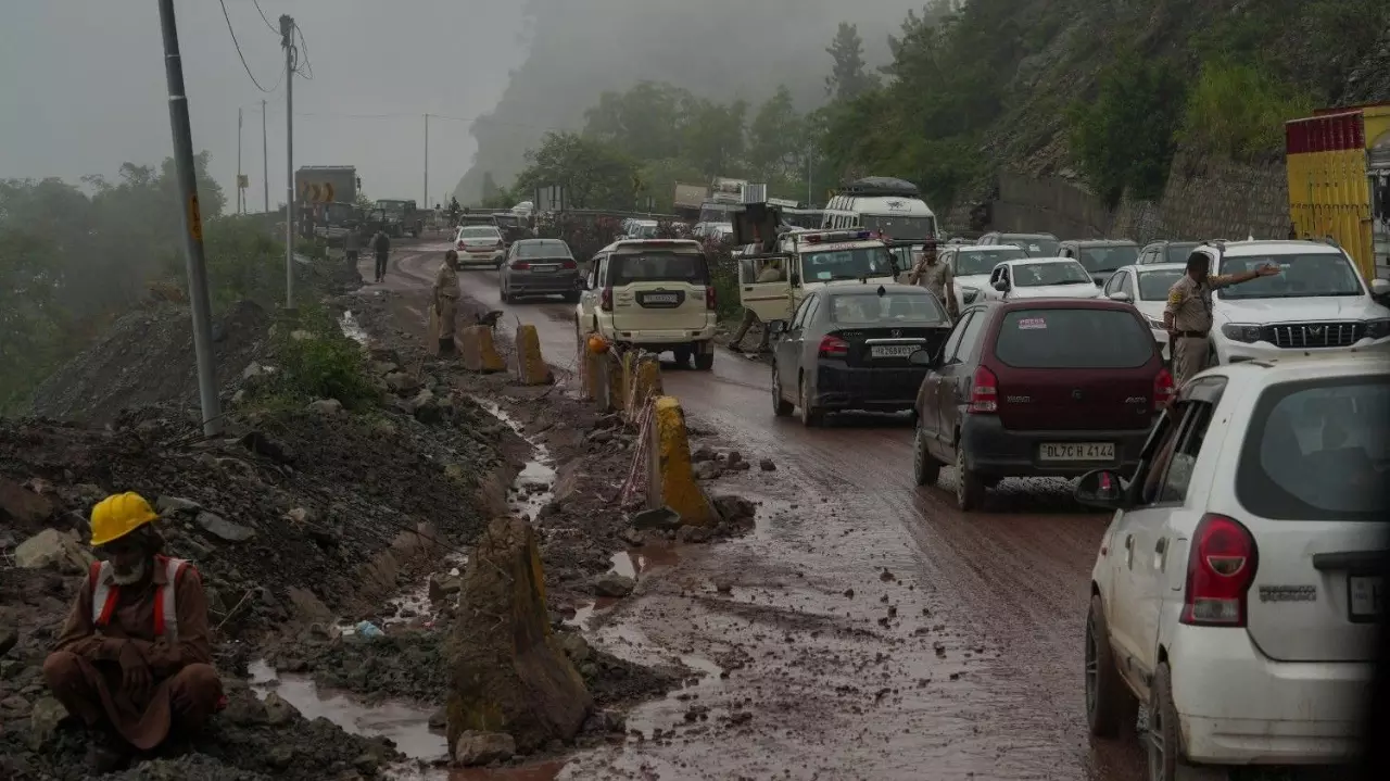 Vehicles move through a traffic congestion on Shimla-Kalka National Highway at Jabli in Solan district Himachal Pradesh
