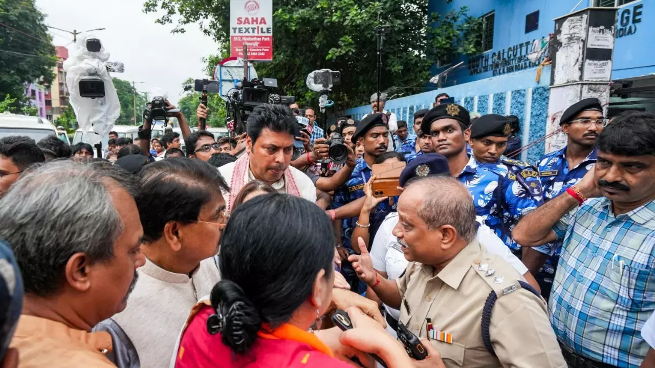 BJP fact-finding team interacts with police officials before their visit at the premises of a law college where an alleged gang rape of a student took place last week in Kolkata. BJP fact-finding team interacts with police officials before their visit at the premises of a law college where an alleged gang rape of a student took place last week in Kolkata.