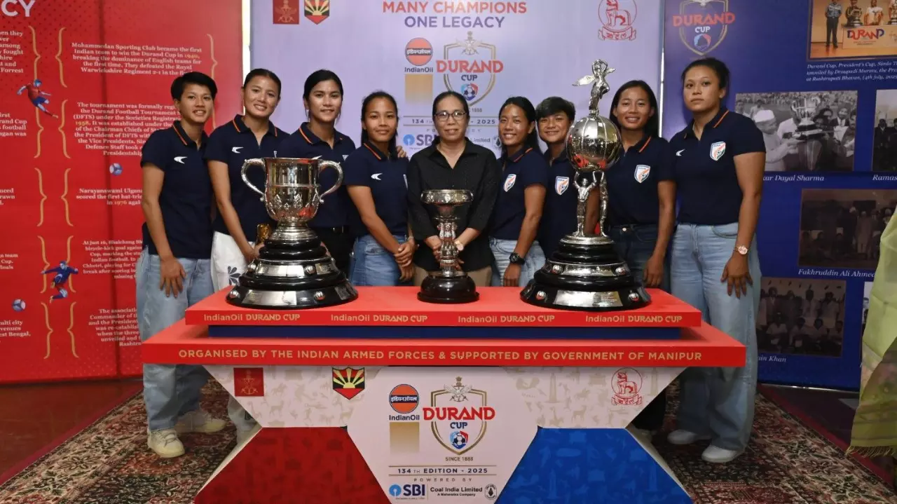 Manipur players pose with Durand Cup trophies