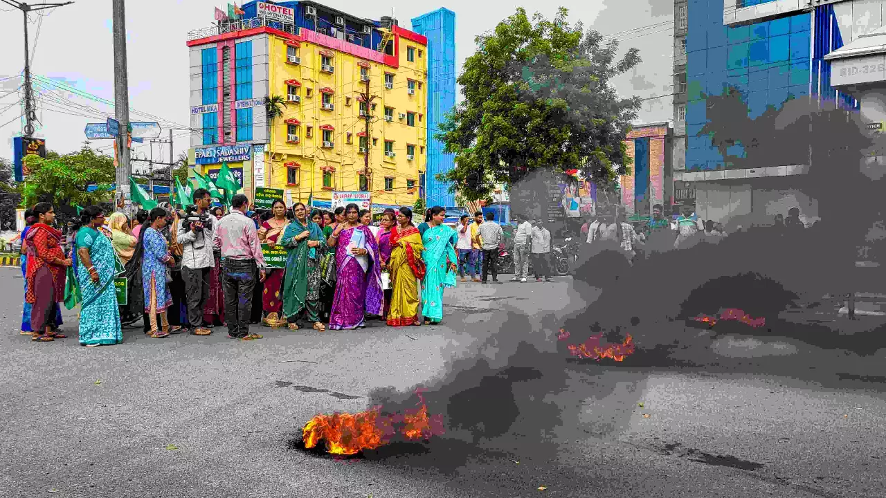 BJD workers take part in a demonstration during a bandh called by the party in Balasore on Wednesday
