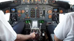 pilots in cockpit