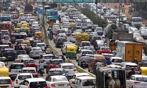 A traffic snarl in Bengaluru. File photo A traffic snarl in Bengaluru. File photo