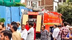 Firemen outside the Kosmos Superspciality Hospital at Anand Bihar area of New Delhi, where a fire broke out, on Saturday, August 9, 2025. (Photo: PTI)