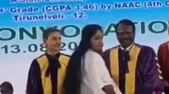 PhD scholar Jean Joseph receives her degree from the Vice-Chancellor of Manonmaniam Sundaranar University, Tirunelveli, N Chandrasekhar (extreme right), after ignoring Governor RN Rai (extreme left), at  a convocation ceremony on August 13, 2025. (X screengrab)
