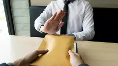 An officer refusing a bribe