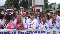 Congress leader Ranajit Mukherjee (white shirt) took part in a rally organised by the SC Federation