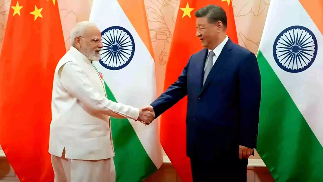 Committed to take forward ties, says Modi; Xi urges Dragon, Elephant to come together Committed to take forward ties, says Modi; Xi urges Dragon, Elephant to come together