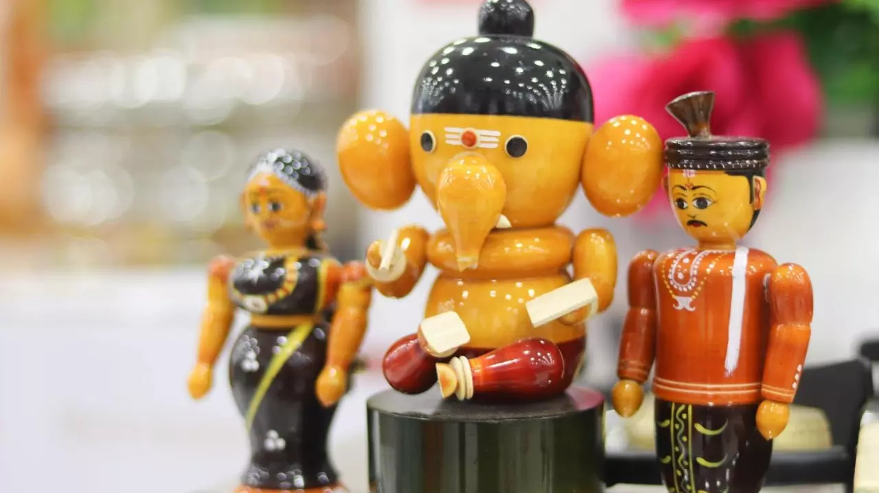 Colorful Channapatna toys of Lord God Ganesha and Man and Woman