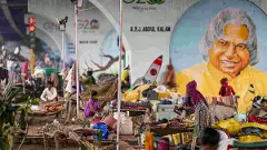 Residents of flood-affected areas take shelter under a flyover, at Mayur Vihar