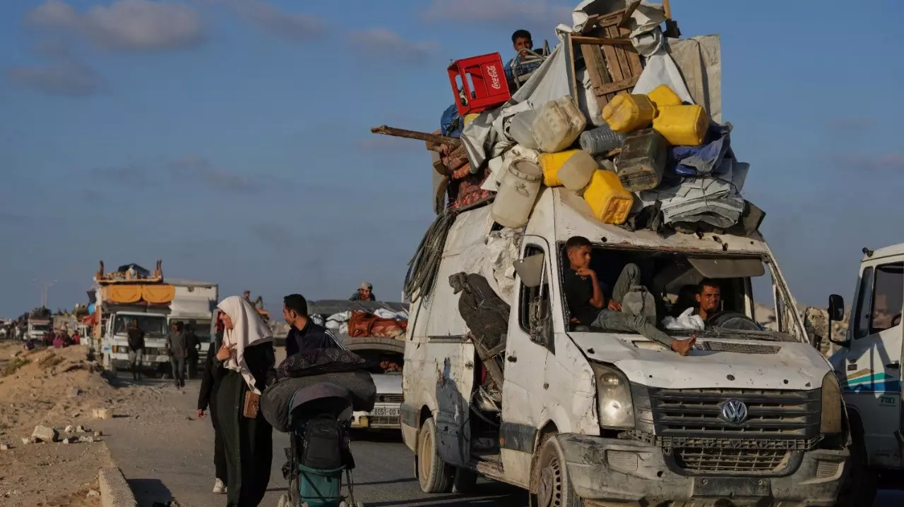 Displaced Palestinians flee northern Gaza with their belongings toward the south on Thursday, September 11, 2025, after the Israeli Army issued evacuation orders from Gaza City. (Photo: AP/PTI)