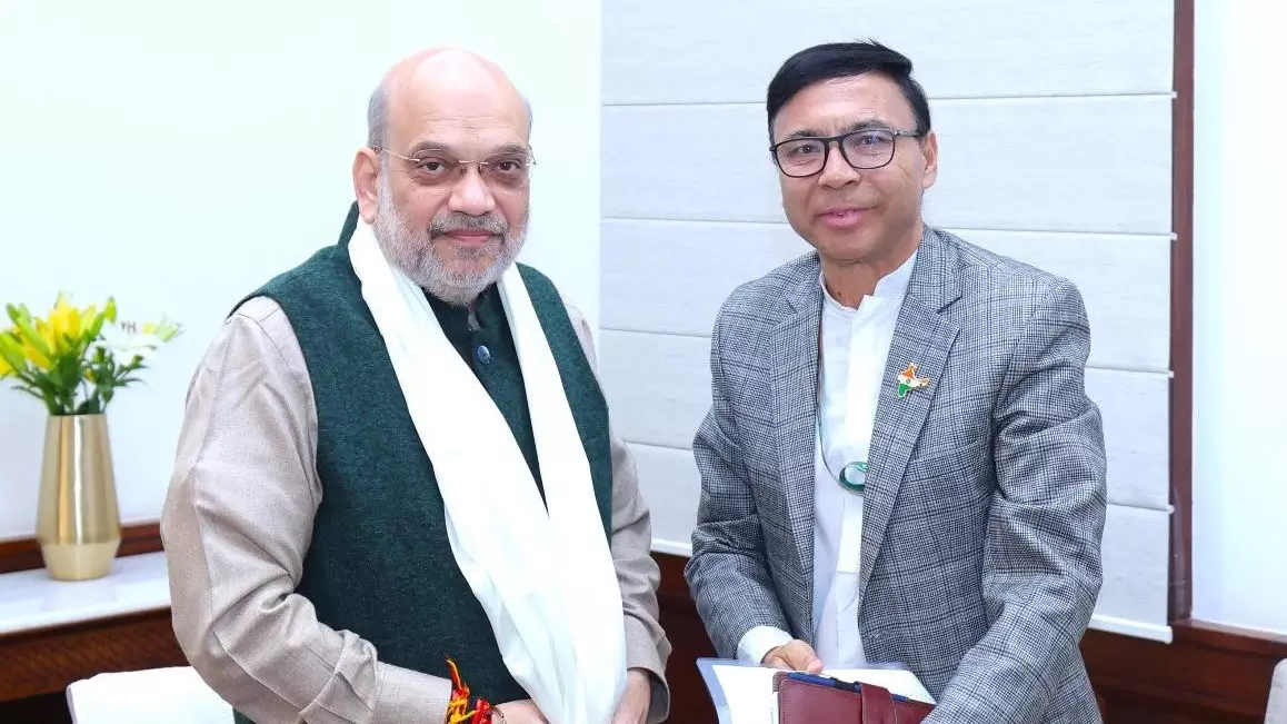 Mohmad Haneefa (right) with Union Home Minister Amit Shah