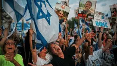 people in Tel Aviv prior to release of Israeli hostages by Hamas