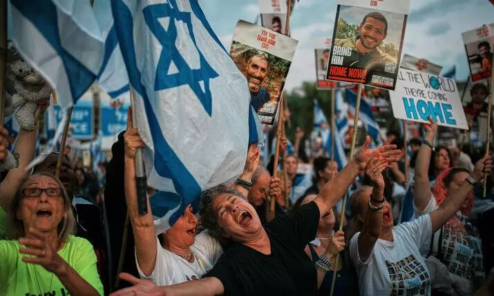 people in Tel Aviv prior to release of Israeli hostages by Hamas people in Tel Aviv prior to release of Israeli hostages by Hamas