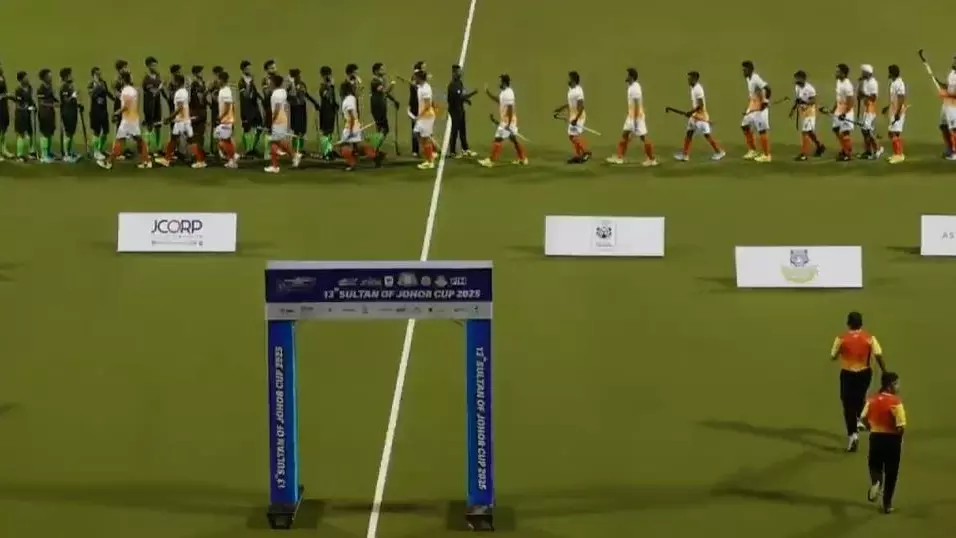 India and Pakistan players exchange high fives India and Pakistan players exchange high fives