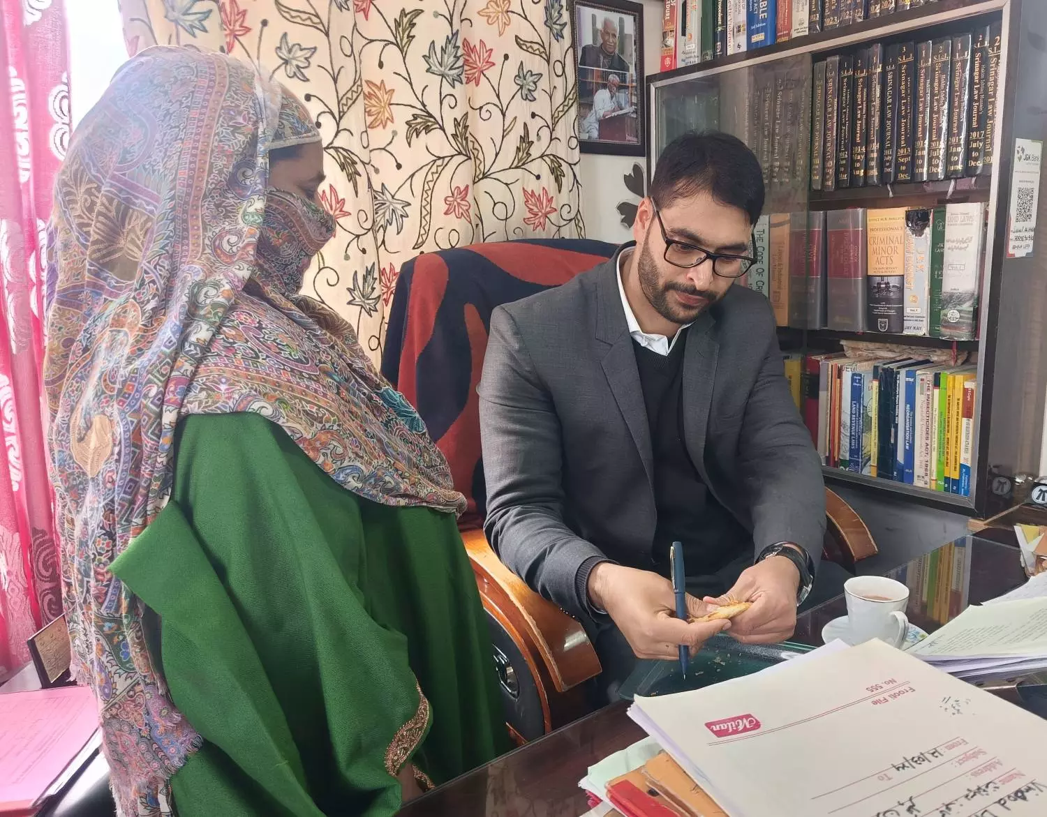 Firdousa Akhtar, with her lawyer. For the past 35 years, Firdousa has been engaged in a legal battle with her brother for her share of her parental property. Photo by Basharat Amin Firdousa Akhtar, with her lawyer. For the past 35 years, Firdousa has been engaged in a legal battle with her brother for her share of her parental property. Photo by Basharat Amin
