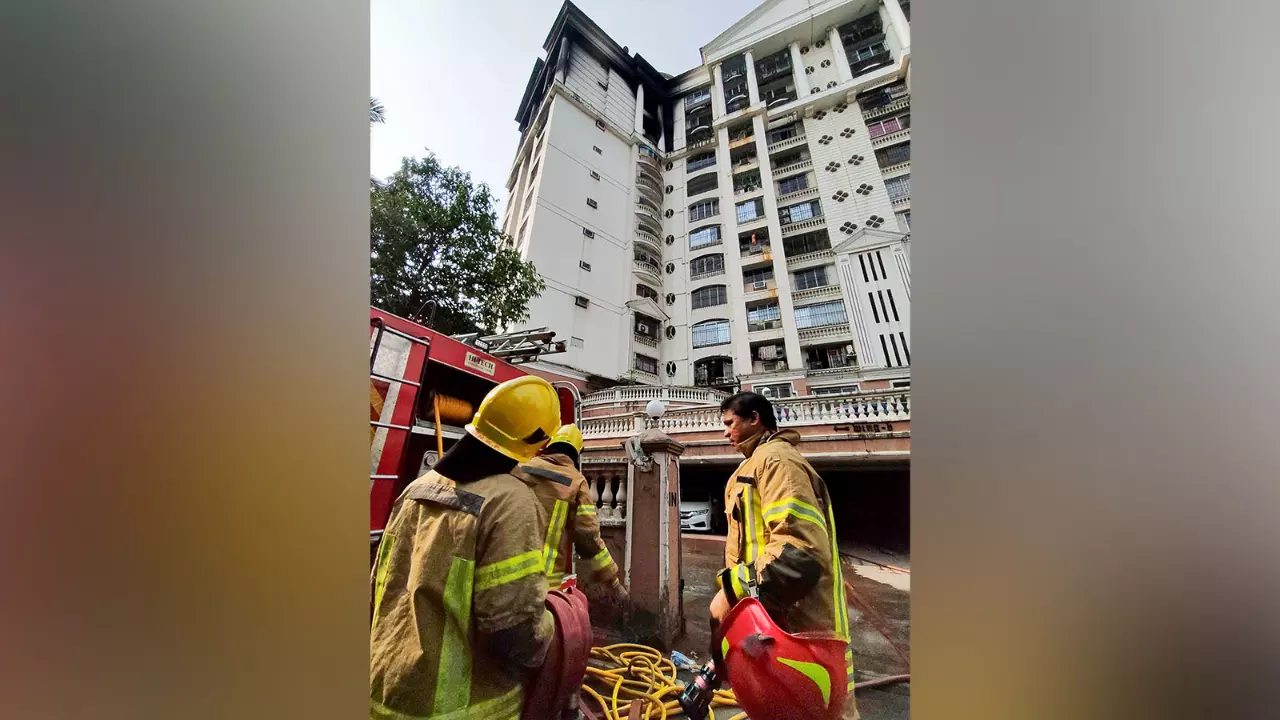 Firefighters at the site after a fire breaks out at Raheja Complex in Vashi Firefighters at the site after a fire breaks out at Raheja Complex in Vashi