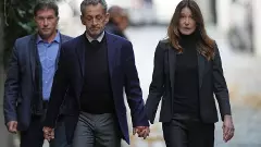Former French President Nicolas Sarkozy (left) and his wife Carla Bruni-Sarkozy (right)
