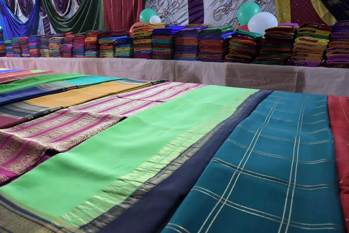 Mysore silk sarees being sold at an exhibition. By special arrangement