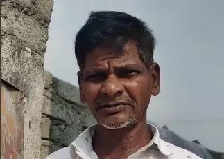 Boya Gangapuri, a daily wage labourer living in Dammayiguda, has developed sores on his hands and legs because of the contaminated water. Photo by Saleem Shaik Boya Gangapuri, a daily wage labourer living in Dammayiguda, has developed sores on his hands and legs because of the contaminated water. Photo by Saleem Shaik
