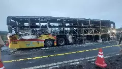 Charred remains of the bus