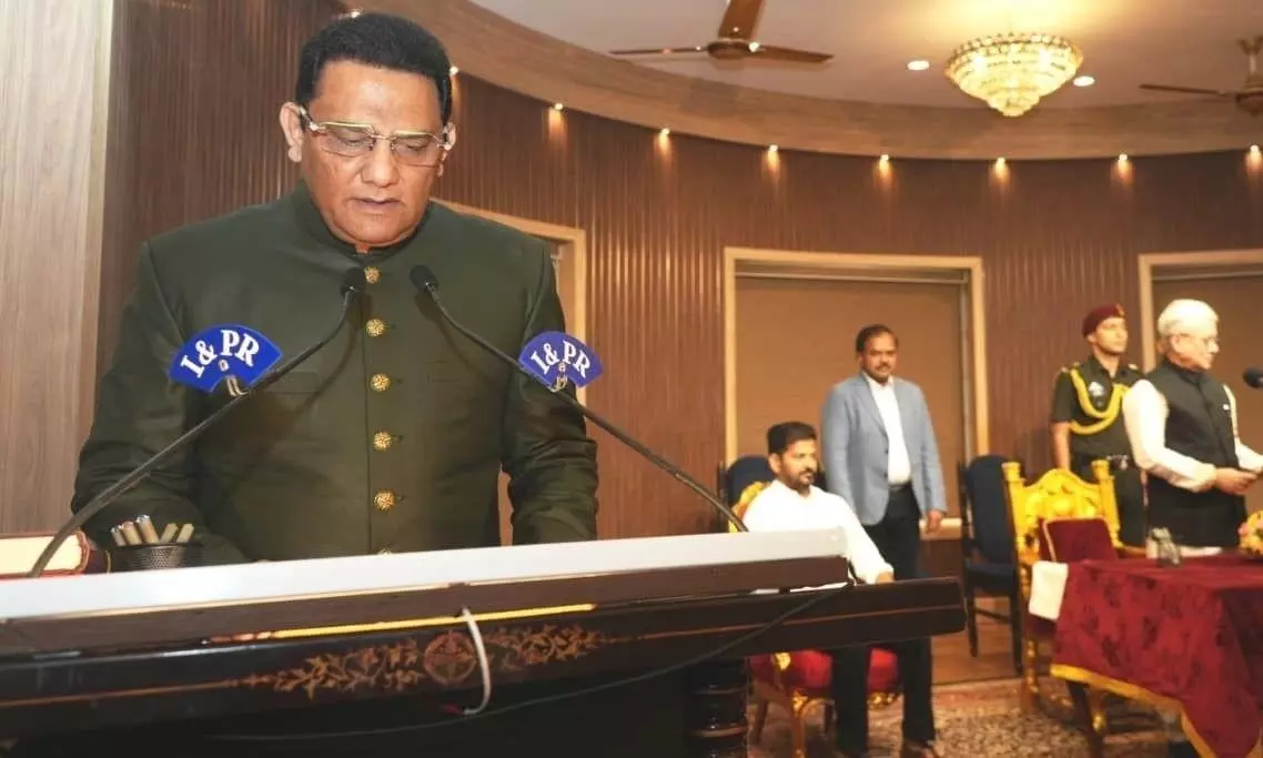 Former cricketer Mohammad Azharuddin swears in as Telangana minister Former cricketer Mohammad Azharuddin swears in as Telangana minister