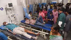 Injured receive medical treatment at a hospital after a tipper lorry in Telangana