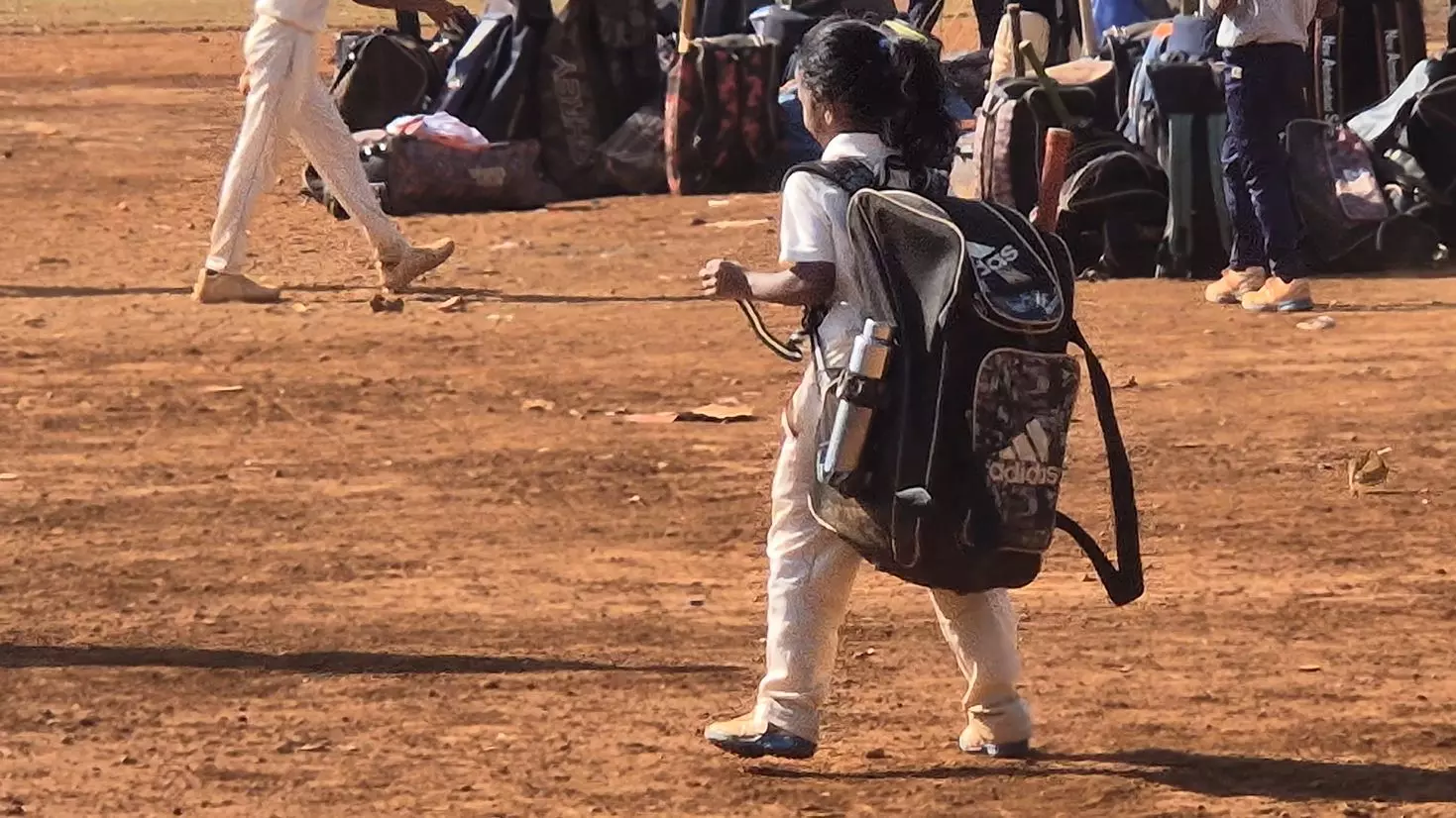 A young girl with her cricket kit. Photo by Siddhaarth Mahan A young girl with her cricket kit. Photo by Siddhaarth Mahan