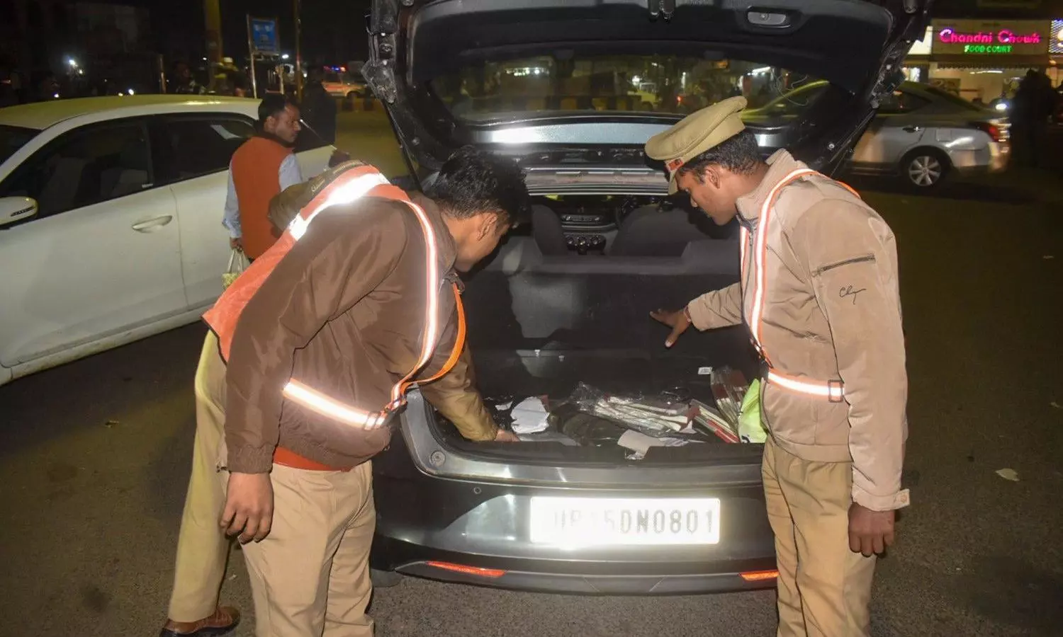 Meerut: Police officials check a vehicle following the car blast incident in Delhi, in Meerut, Uttar Pradesh, Monday, Nov. 10, 2025