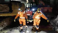 Rescue operation after a portion of a stone quarry collapsed, in Sonbhadra, UP